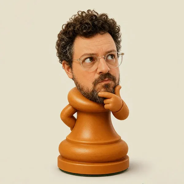 A chess pawn carved with my own face on it, thinking